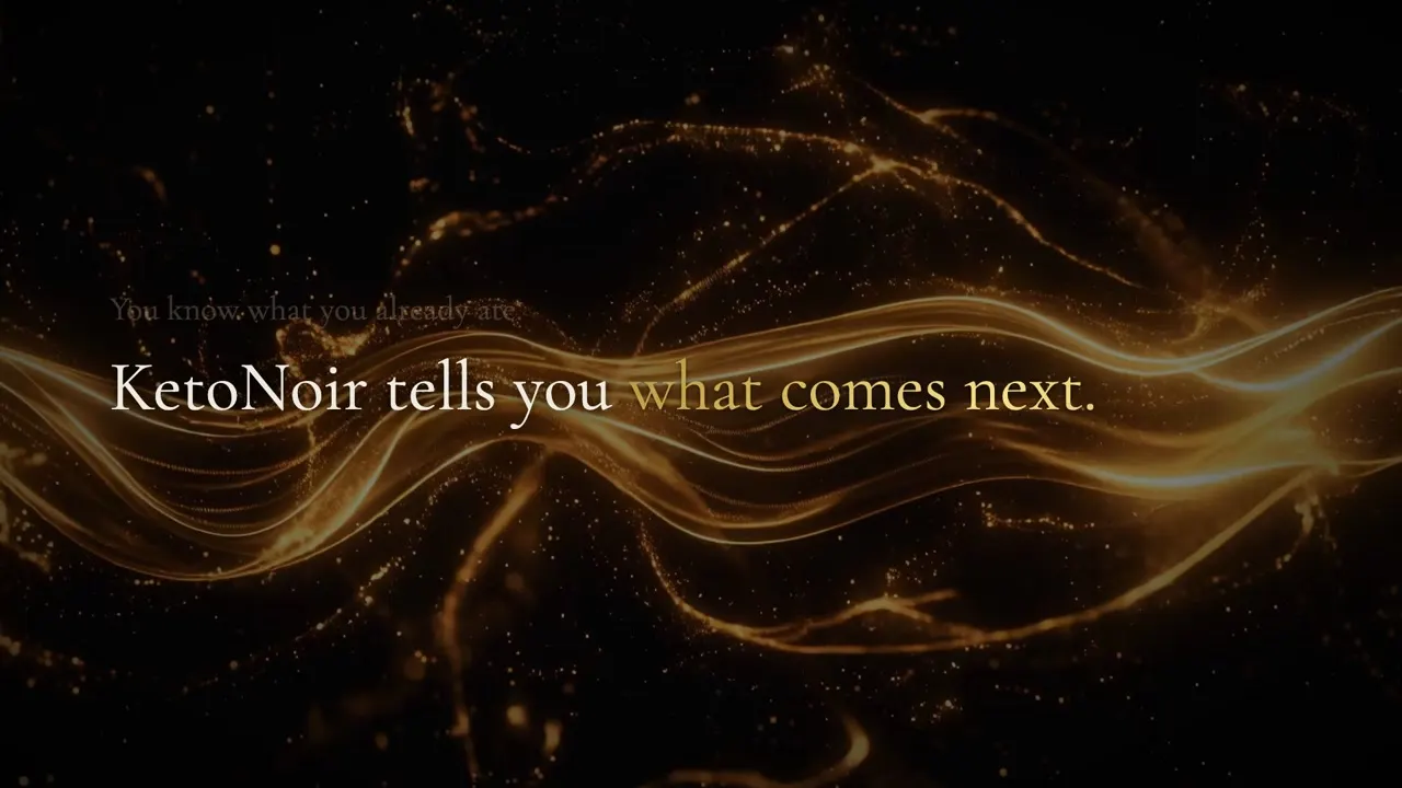 Flowing gold light on black with the words: KetoNoir tells you what comes next.